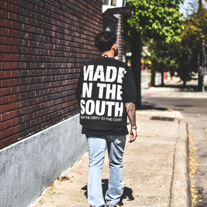 made in the south shirt on a guy walking down the street