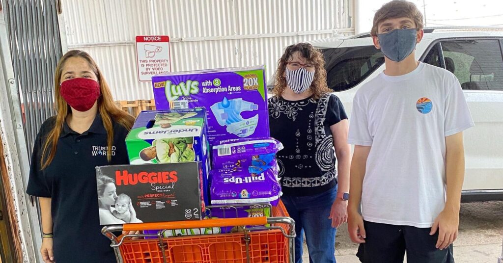volunteers and goods at trusted world